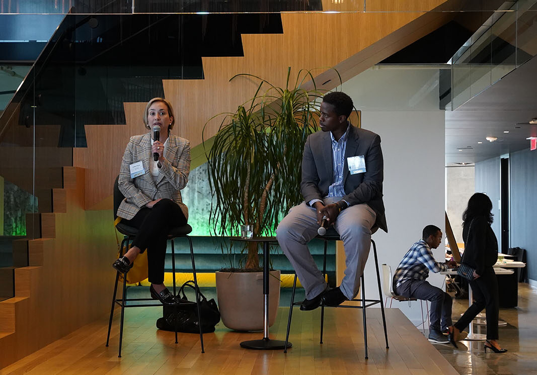 A woman and a man on a panel at NVTC's 2022 Intern Reception