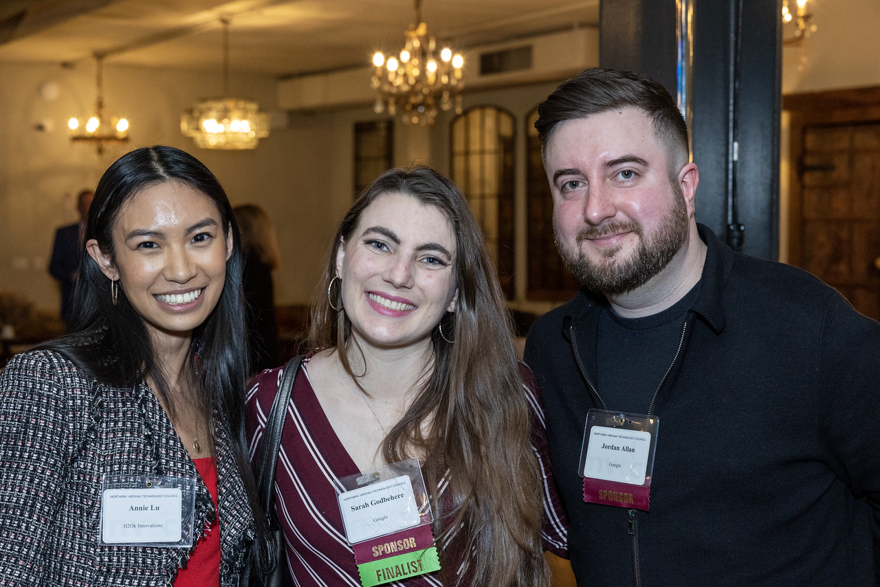 Two women and a man posing for a picture at the NVTC Data Center Award