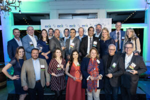 The winners of the 2022 Data Center Awards in front of an NVTC step-and-repeat