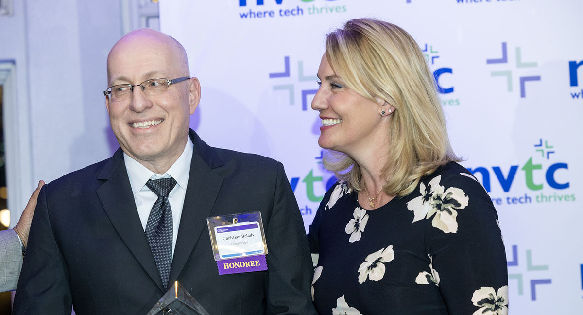 Photo of Jennifer Taylor next to Christian Belady being awarded the Data Center Icon Award.